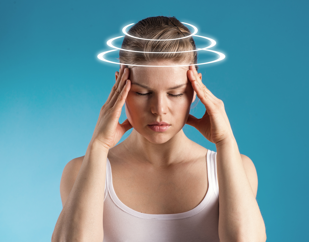 Women holding head with stress tension